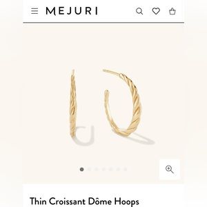 Vermeil gold thin croissant hoops from Mejuri.